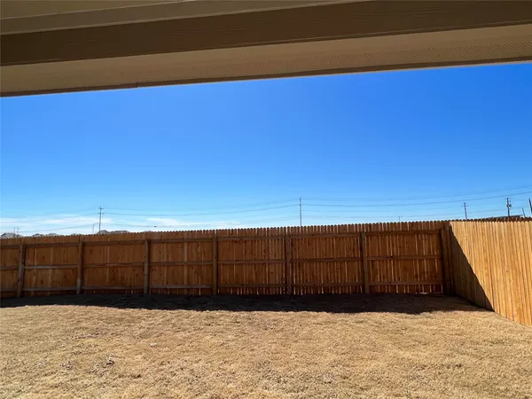 a view of wooden fence