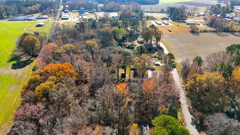 a view of swimming pool with a outdoor seating