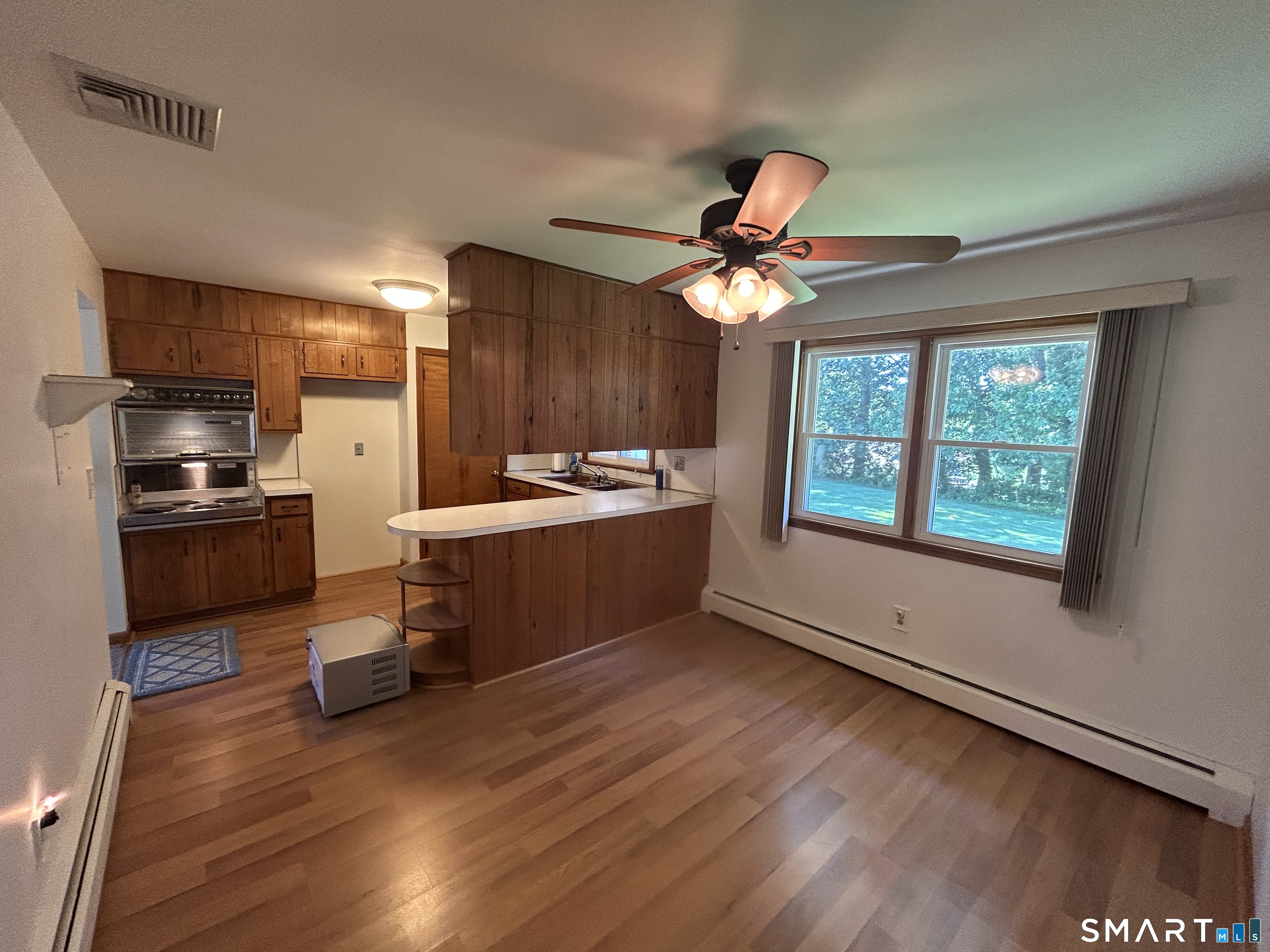 13 Walnut Lane Wallingford, CT 06492 - Photo 10 of 27 a kitchen with a sink appliances and cabinets