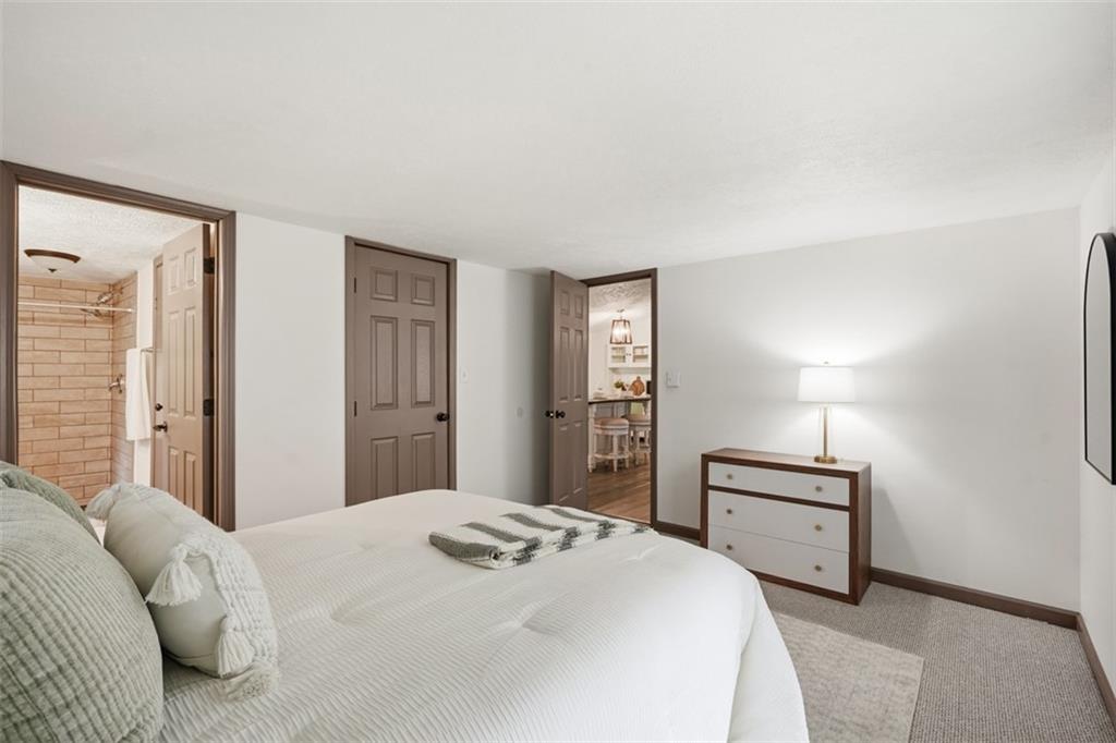 8517 Wittmer Road Pittsburgh, PA 15237 - Photo 20 of 46 a bedroom with a bed and a closet