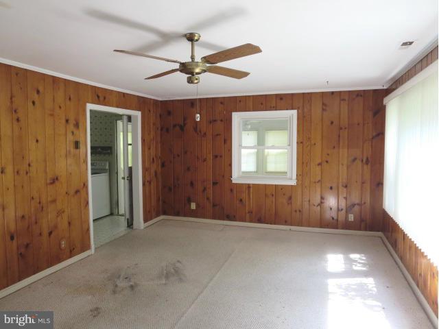 1616 Walnut Road St. Leonard, MD 20685 - Photo 3 of 11 a view of livingroom with window and a ceiling fan