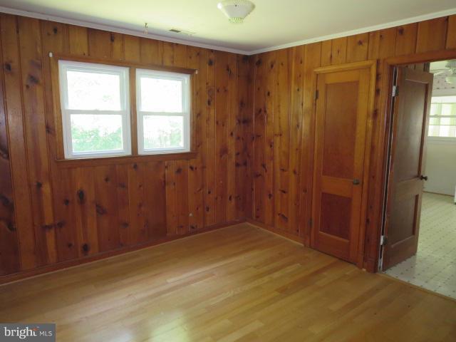 1616 Walnut Road St. Leonard, MD 20685 - Photo 5 of 11 a view of an empty room with window and closet area