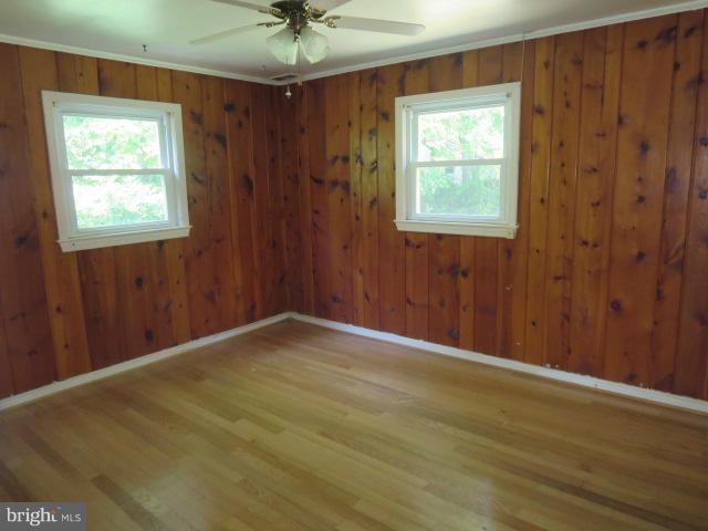 1616 Walnut Road St. Leonard, MD 20685 - Photo 6 of 11 a view of an empty room with a window