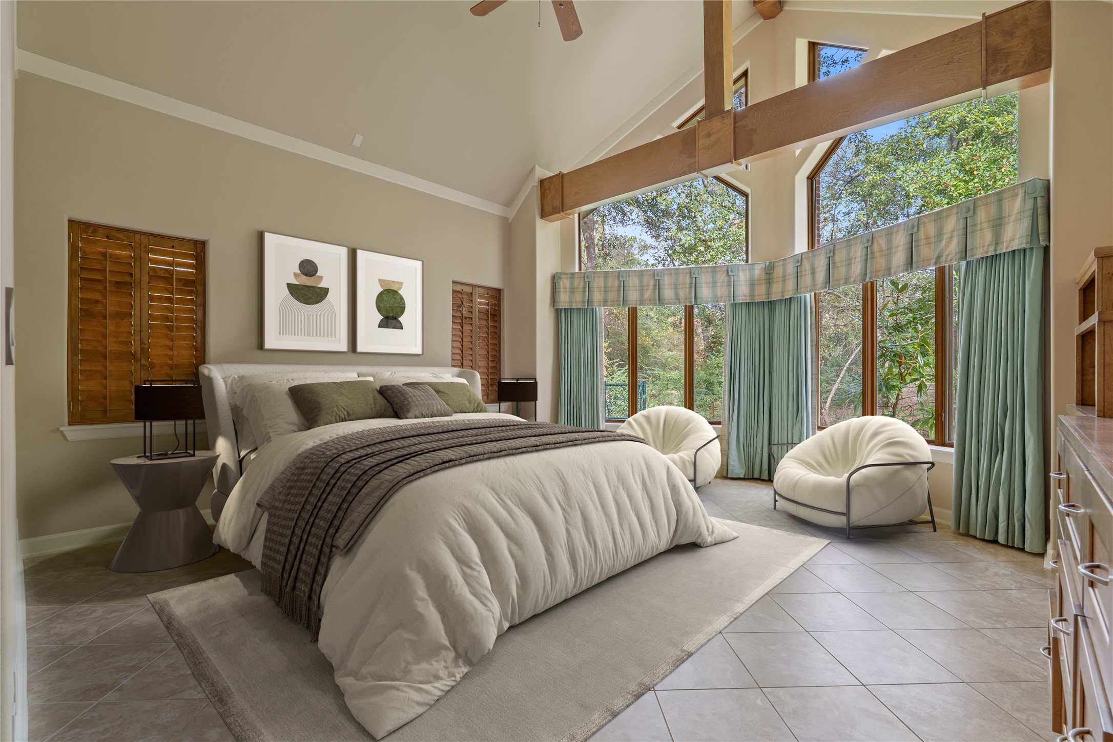 16621 Hereford Road Tomball, TX 77377 - Photo 19 of 46 a spacious bedroom with a bed and a large window