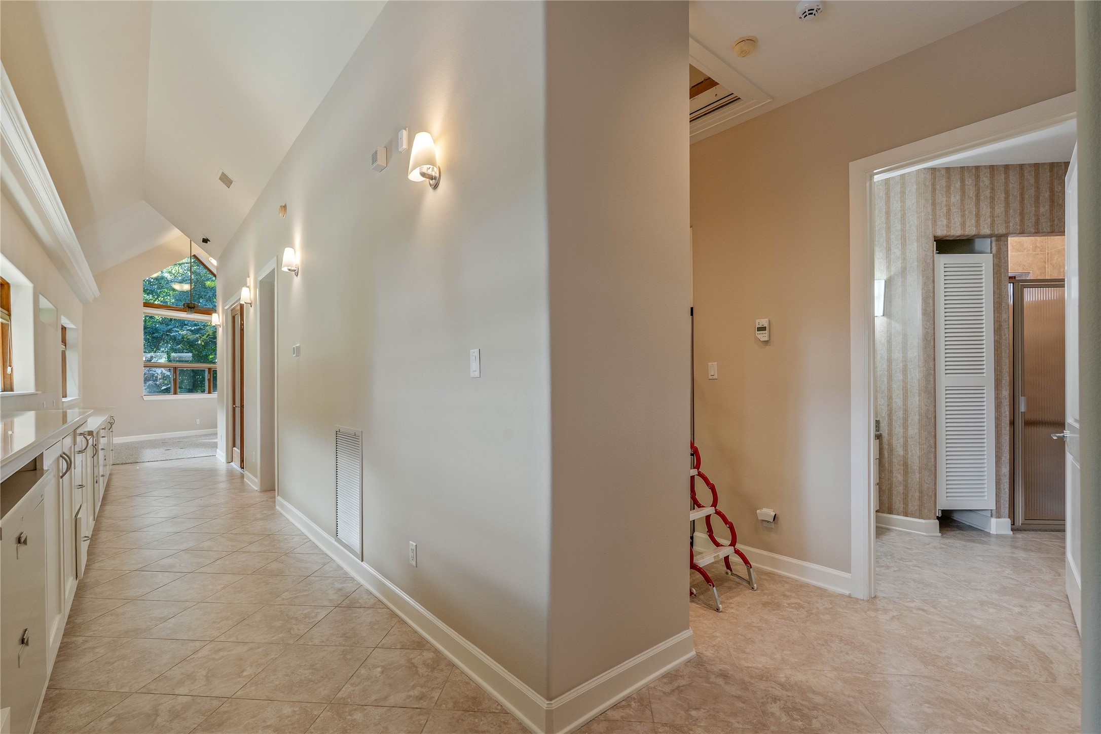 16621 Hereford Road Tomball, TX 77377 - Photo 33 of 46 a view of a hallway with bathroom and front door