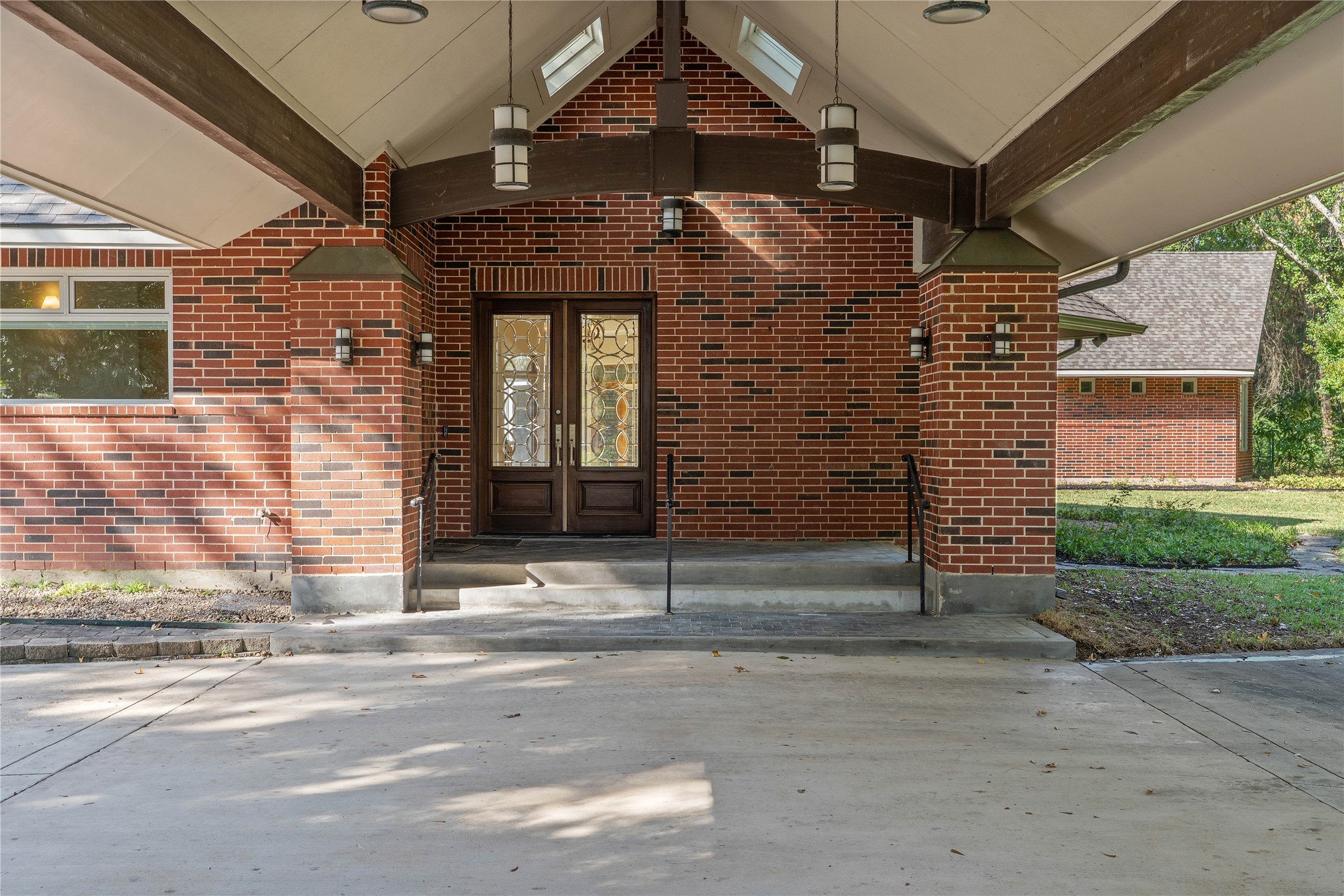 16621 Hereford Road Tomball, TX 77377 - Photo 4 of 46 a view of a brick house with a street
