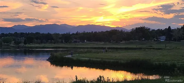 a view of a lake with mountain in the background