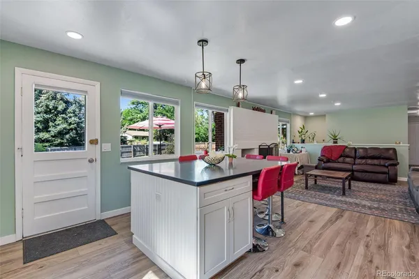 a kitchen with a sink and cabinets