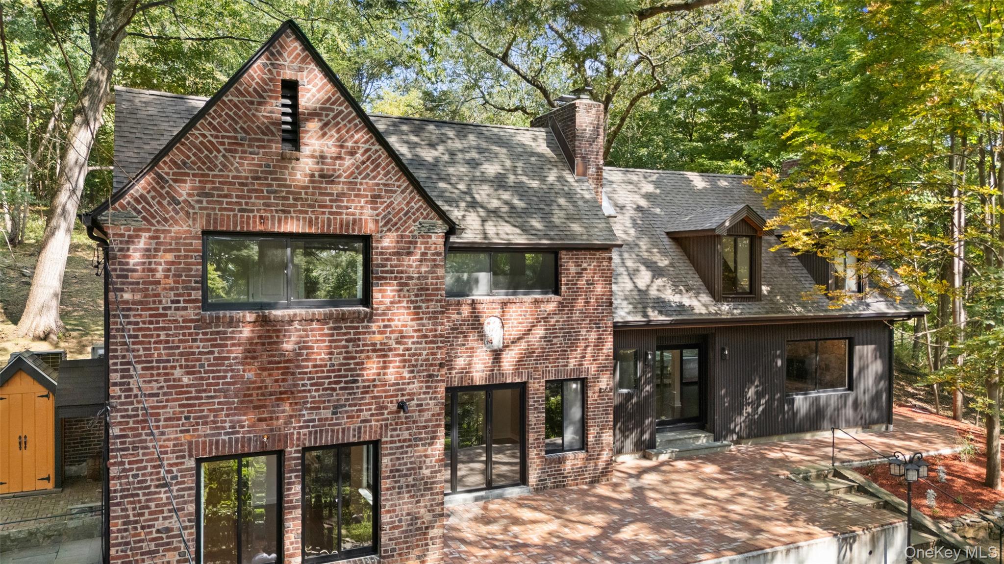 27 Hardscrabble Road Briarcliff Manor, NY 10510 - Photo 13 of 43 a view of house with yard and outdoor seating