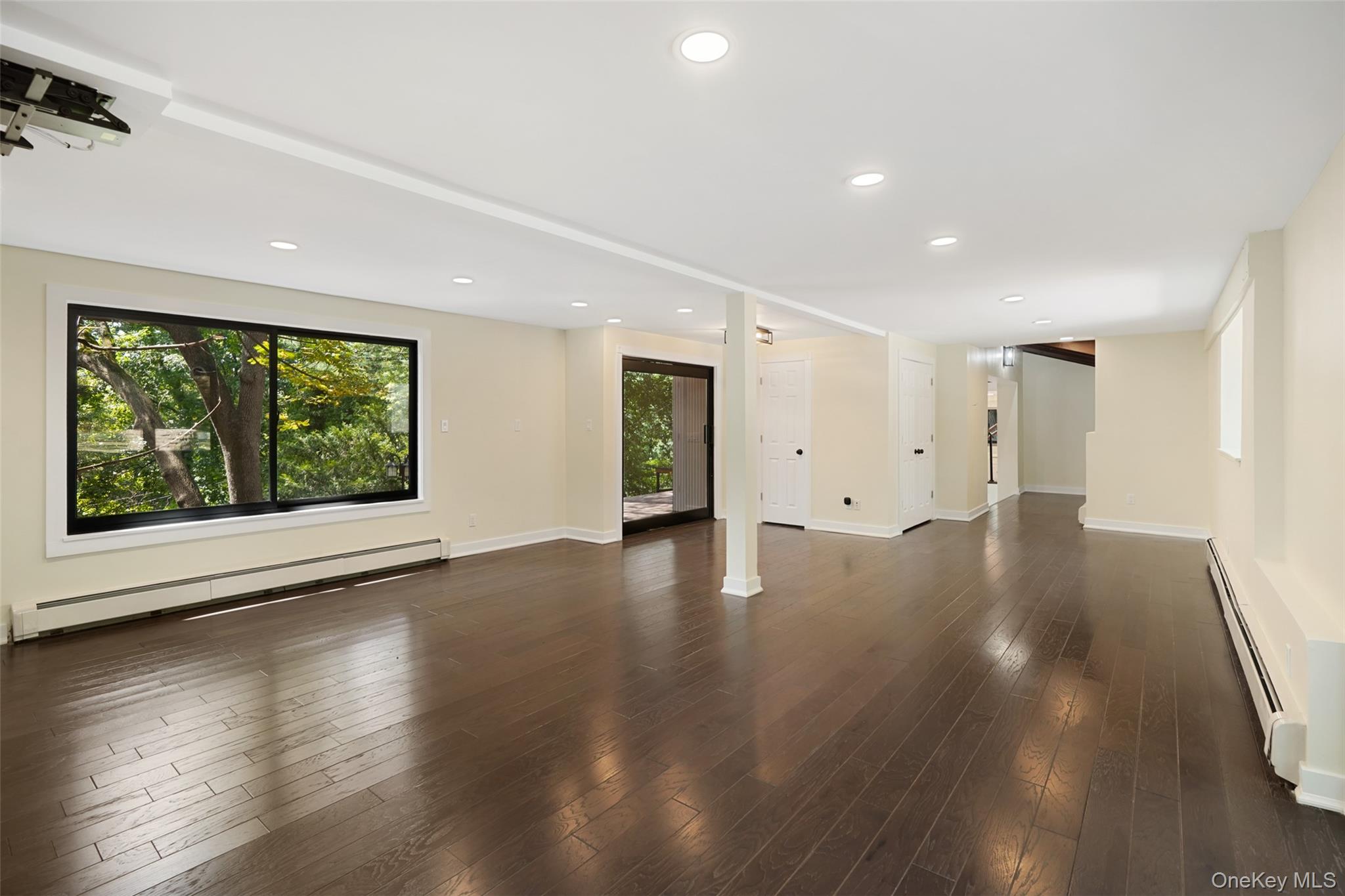 27 Hardscrabble Road Briarcliff Manor, NY 10510 - Photo 18 of 43 a view of a livingroom with wooden floor and window