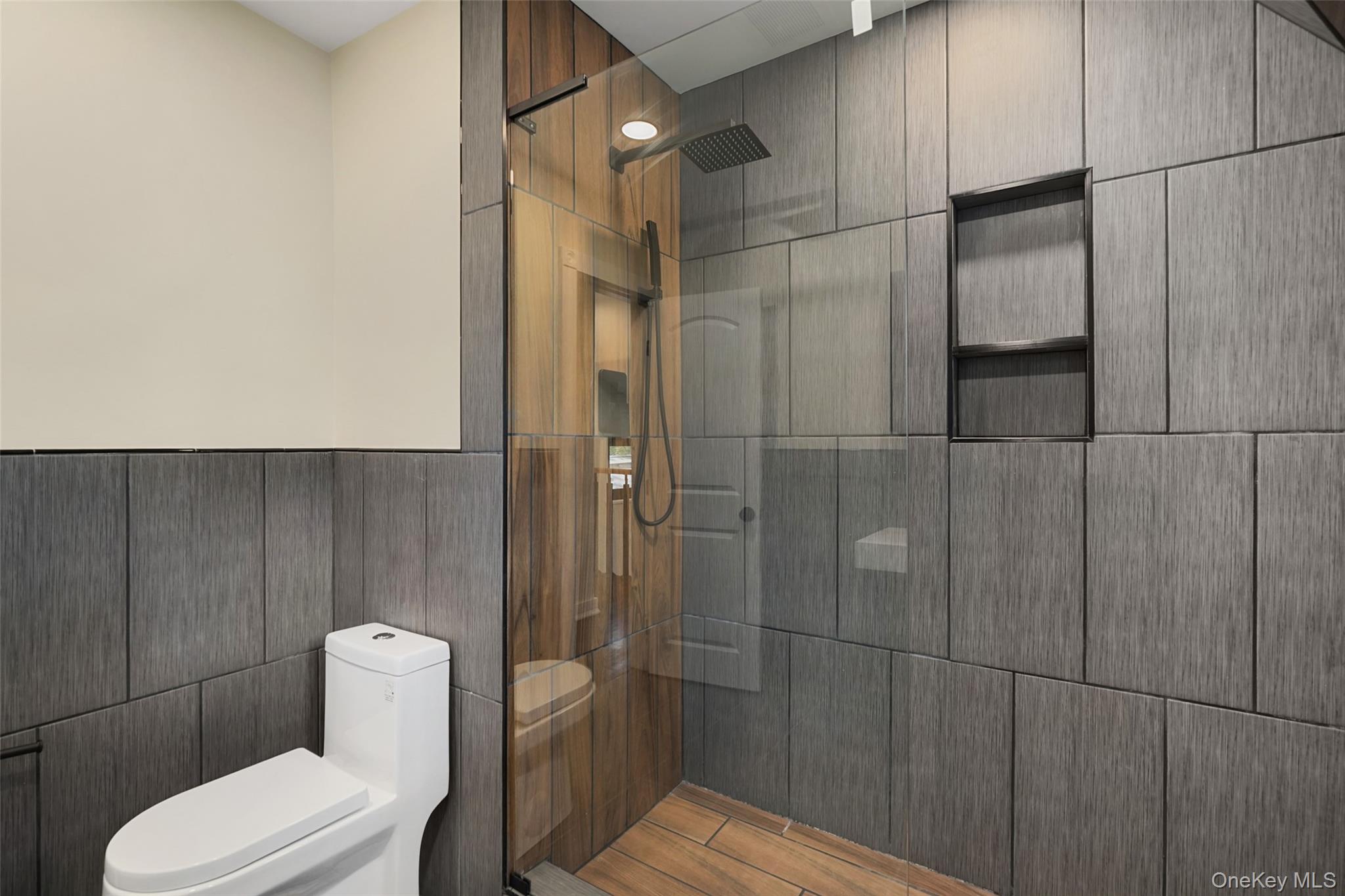 27 Hardscrabble Road Briarcliff Manor, NY 10510 - Photo 22 of 43 a bathroom with a toilet and a shower