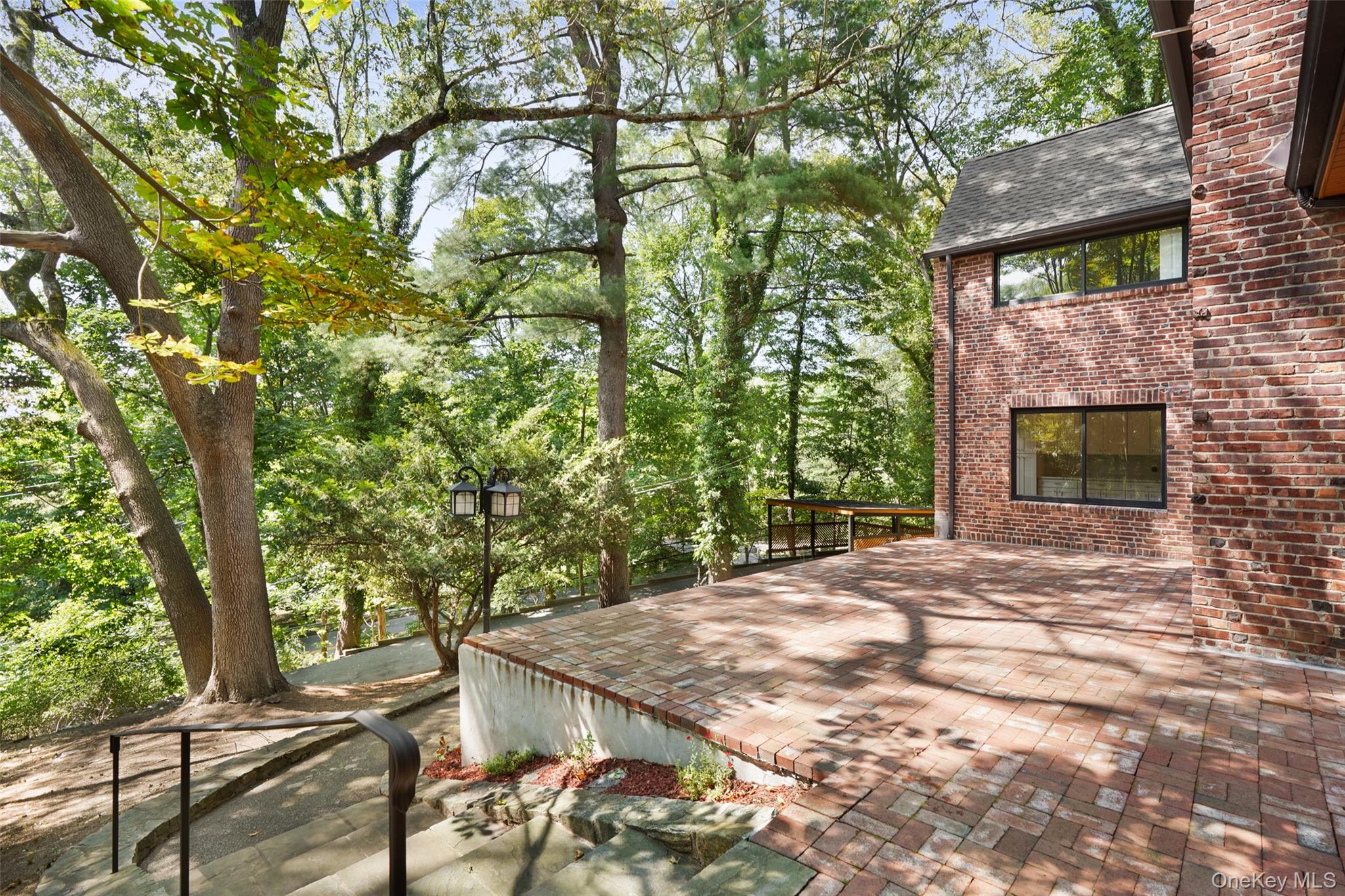 27 Hardscrabble Road Briarcliff Manor, NY 10510 - Photo 26 of 43 a outdoor space with plants and trees