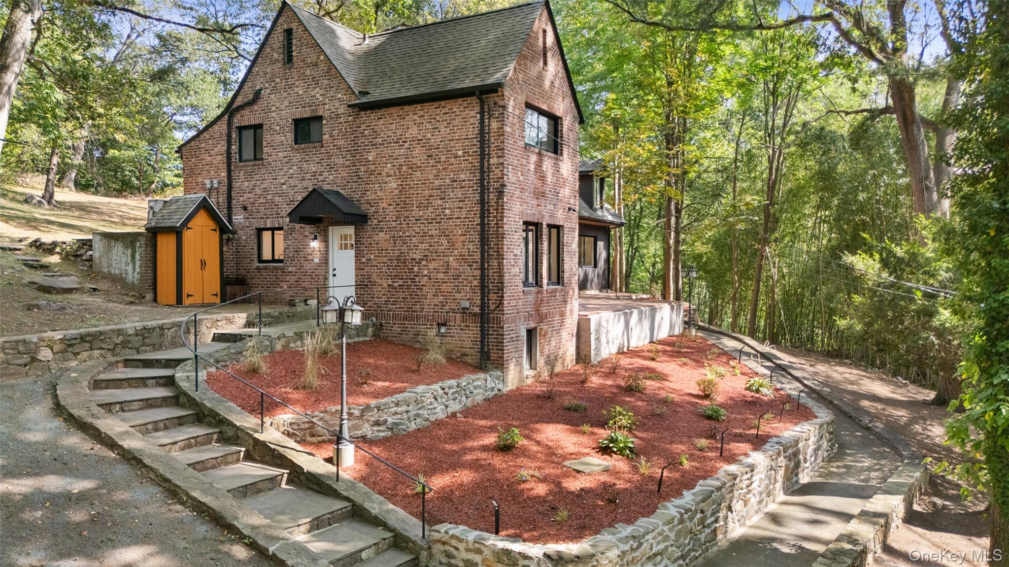 27 Hardscrabble Road Briarcliff Manor, NY 10510 - Photo 37 of 43 a view of a house with backyard