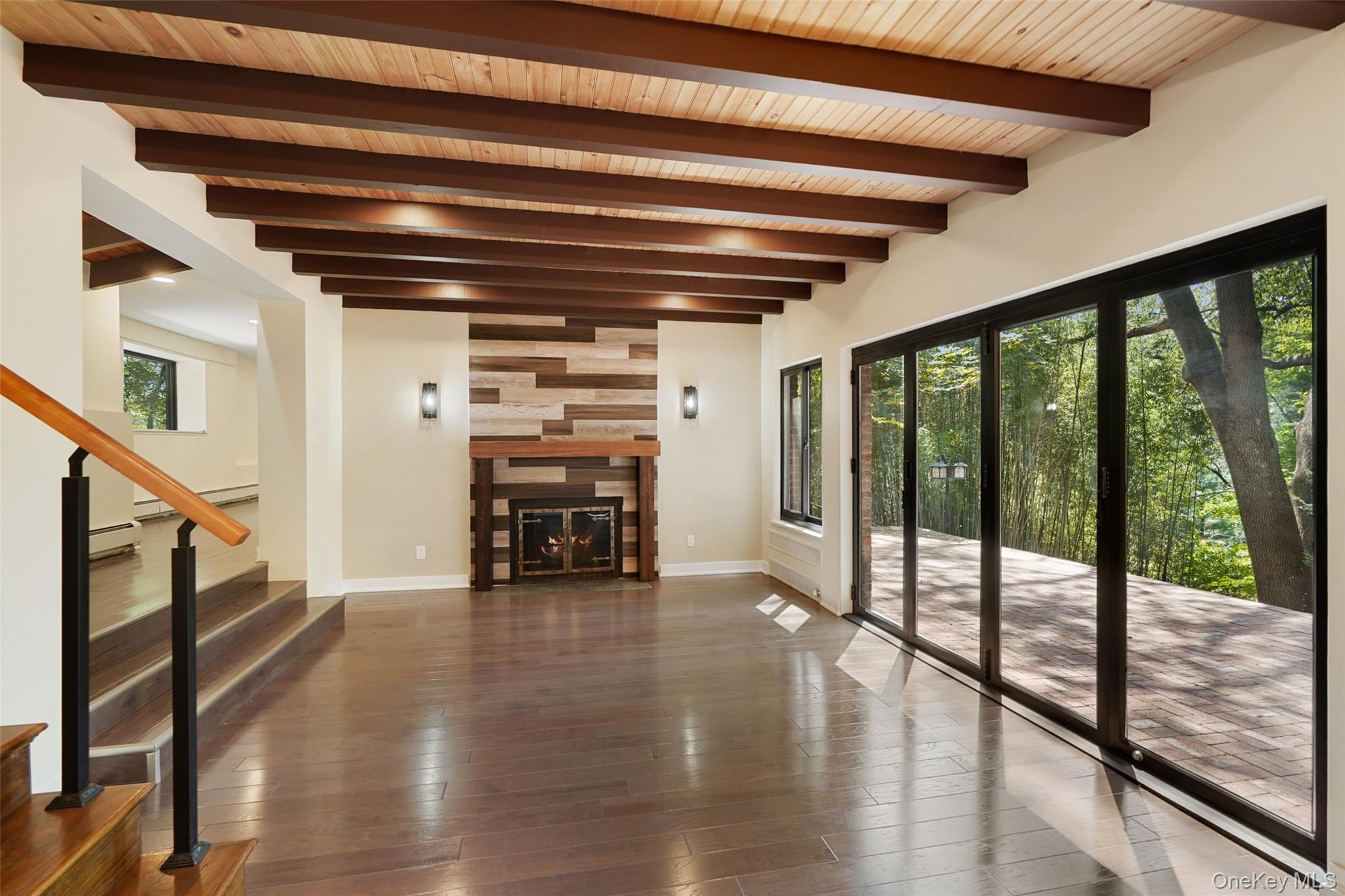 27 Hardscrabble Road Briarcliff Manor, NY 10510 - Photo 3 of 43 a view of empty room with wooden floor