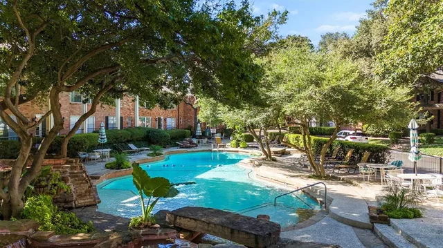 a view of balcony with garden