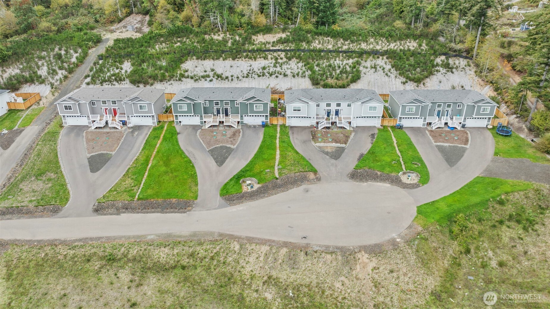 19019 Highway 3, Unit B Allyn, WA 98524 - Photo 22 of 23 an aerial view of residential houses with outdoor space