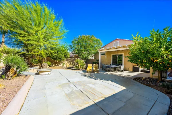 a view of a house with sitting area and furniture