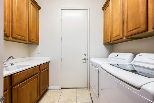 a utility room with a sink