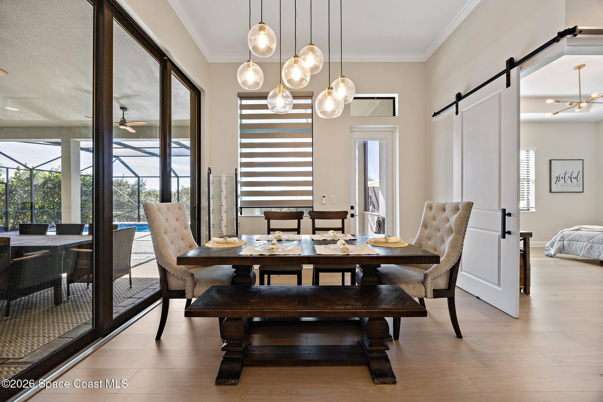 4055 Domain Court Melbourne, FL 32934 - Photo 16 of 49 a view of a dining room with furniture window and outside view