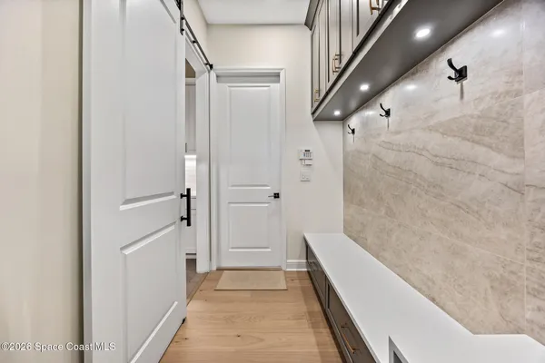 a room with lots of different colored cloths