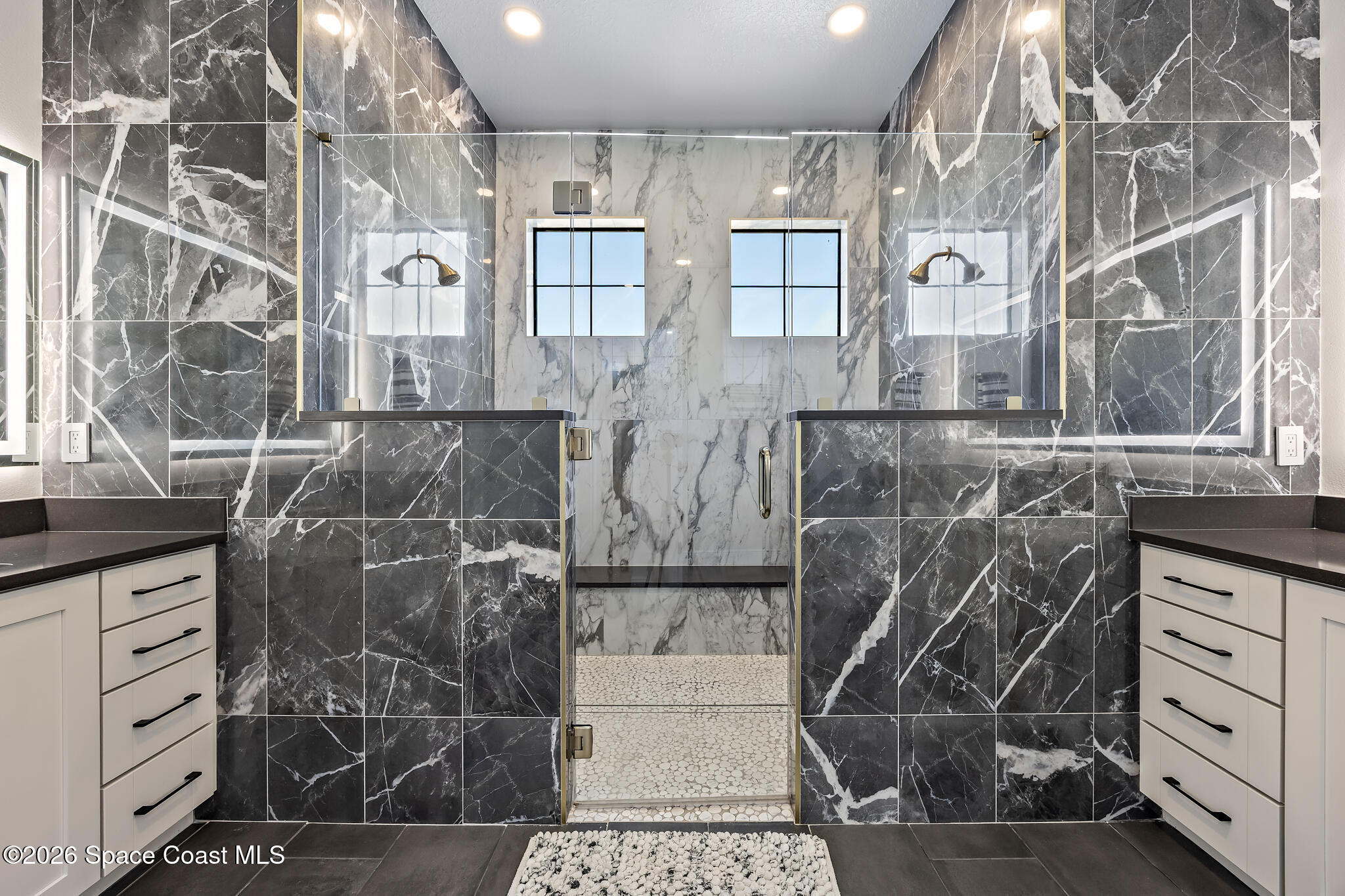 4055 Domain Court Melbourne, FL 32934 - Photo 24 of 49 a bathroom with a shower