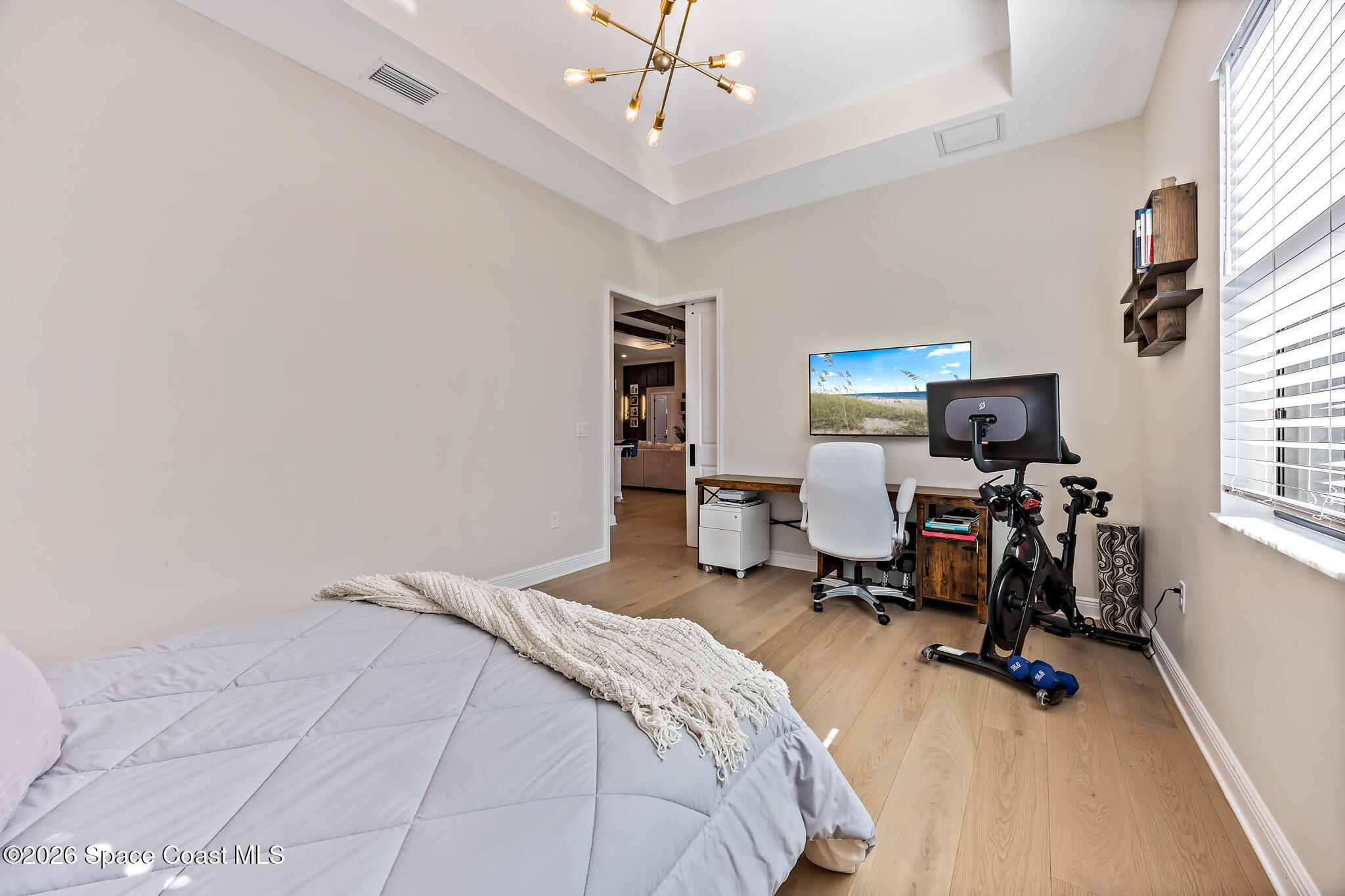 4055 Domain Court Melbourne, FL 32934 - Photo 35 of 49 a bedroom with bed tv and window