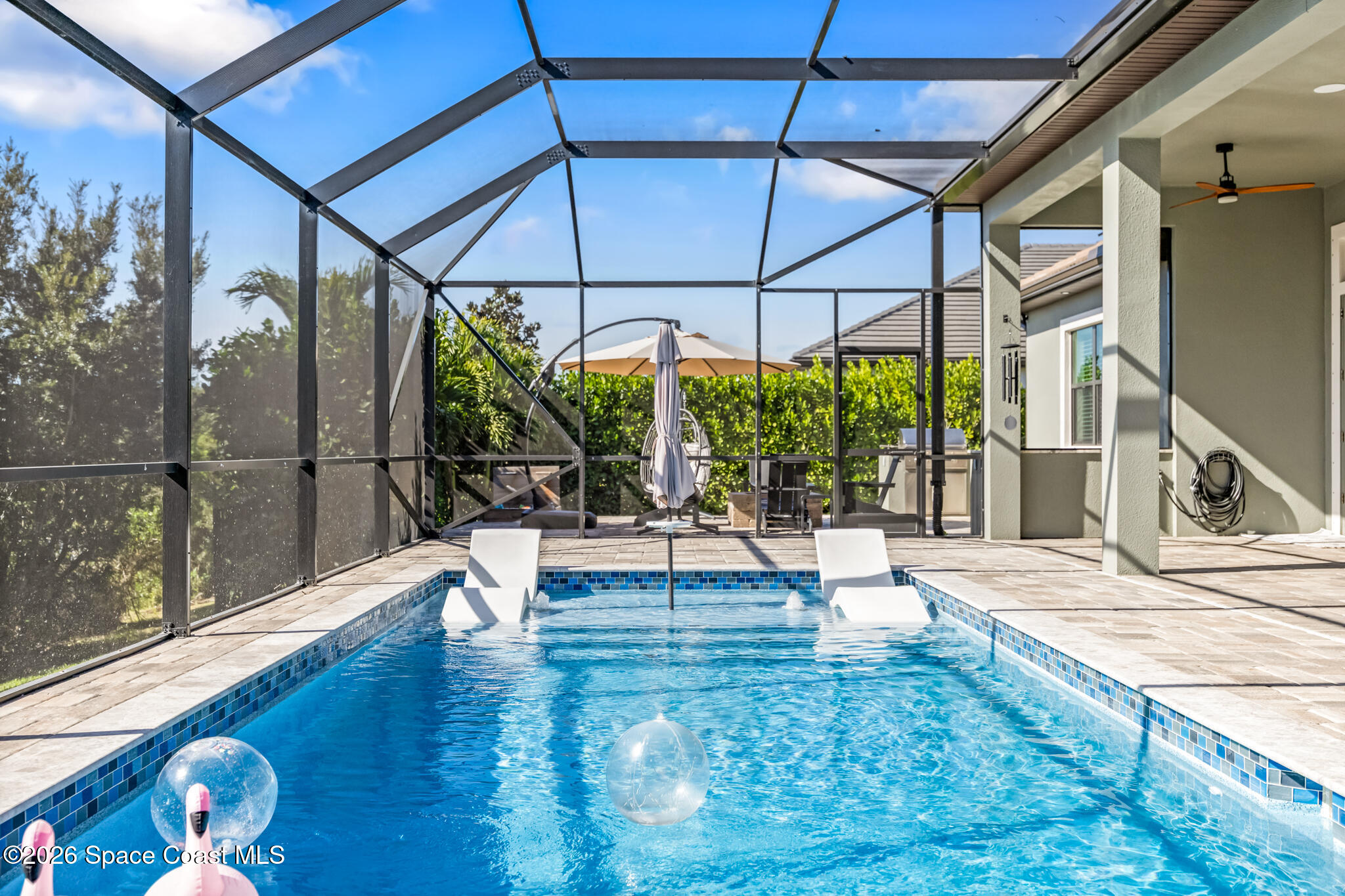 4055 Domain Court Melbourne, FL 32934 - Photo 42 of 49 a view of yard with patio