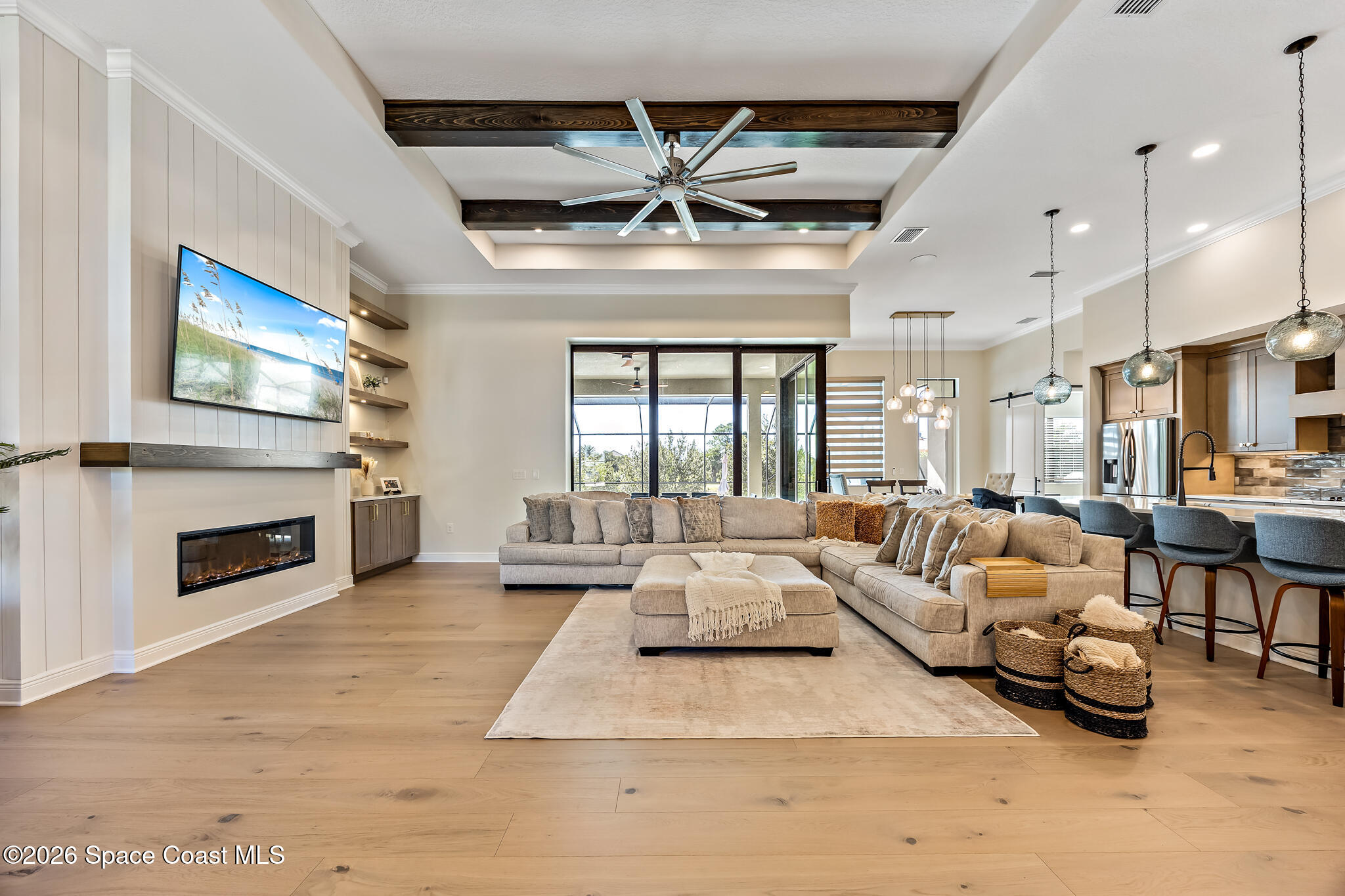 4055 Domain Court Melbourne, FL 32934 - Photo 8 of 49 a living room with furniture and a fireplace