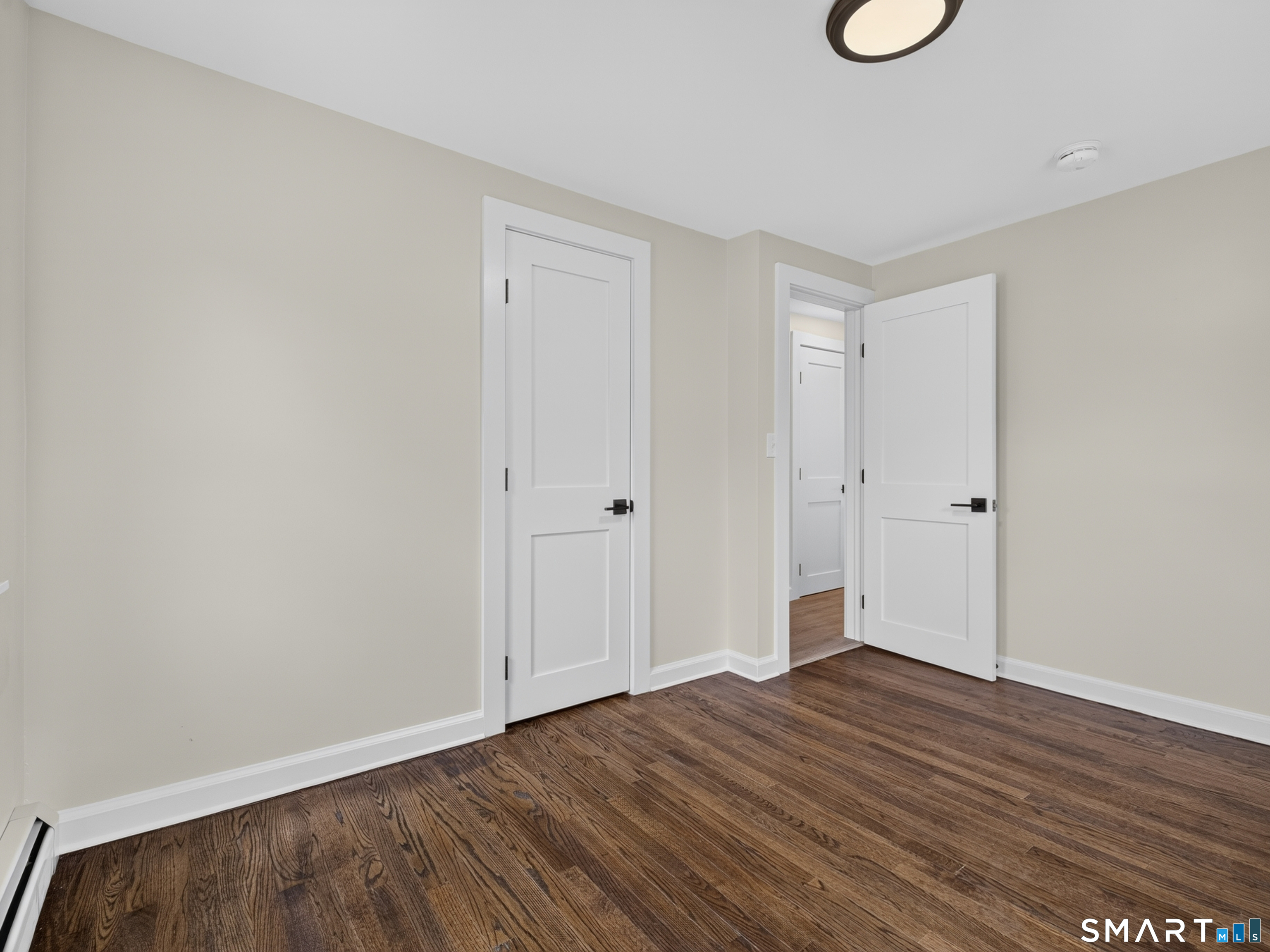1039 N Road Groton, CT 06340 - Photo 14 of 26 a view of a room with wooden floor