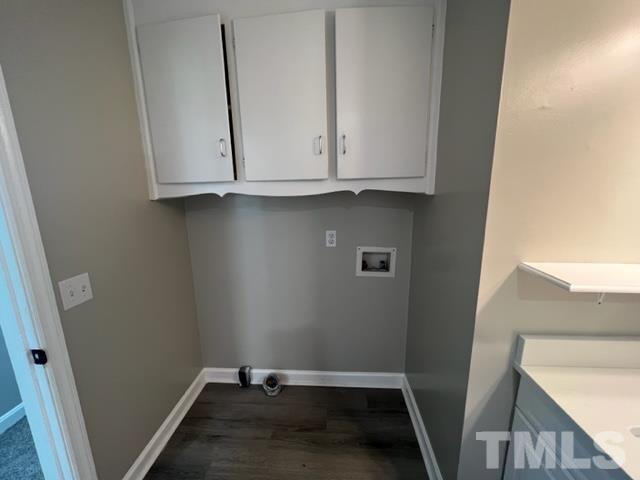 100 Lilly Street Dunn, NC 28334 - Photo 9 of 19 a view of storage and utility room with wooden floor
