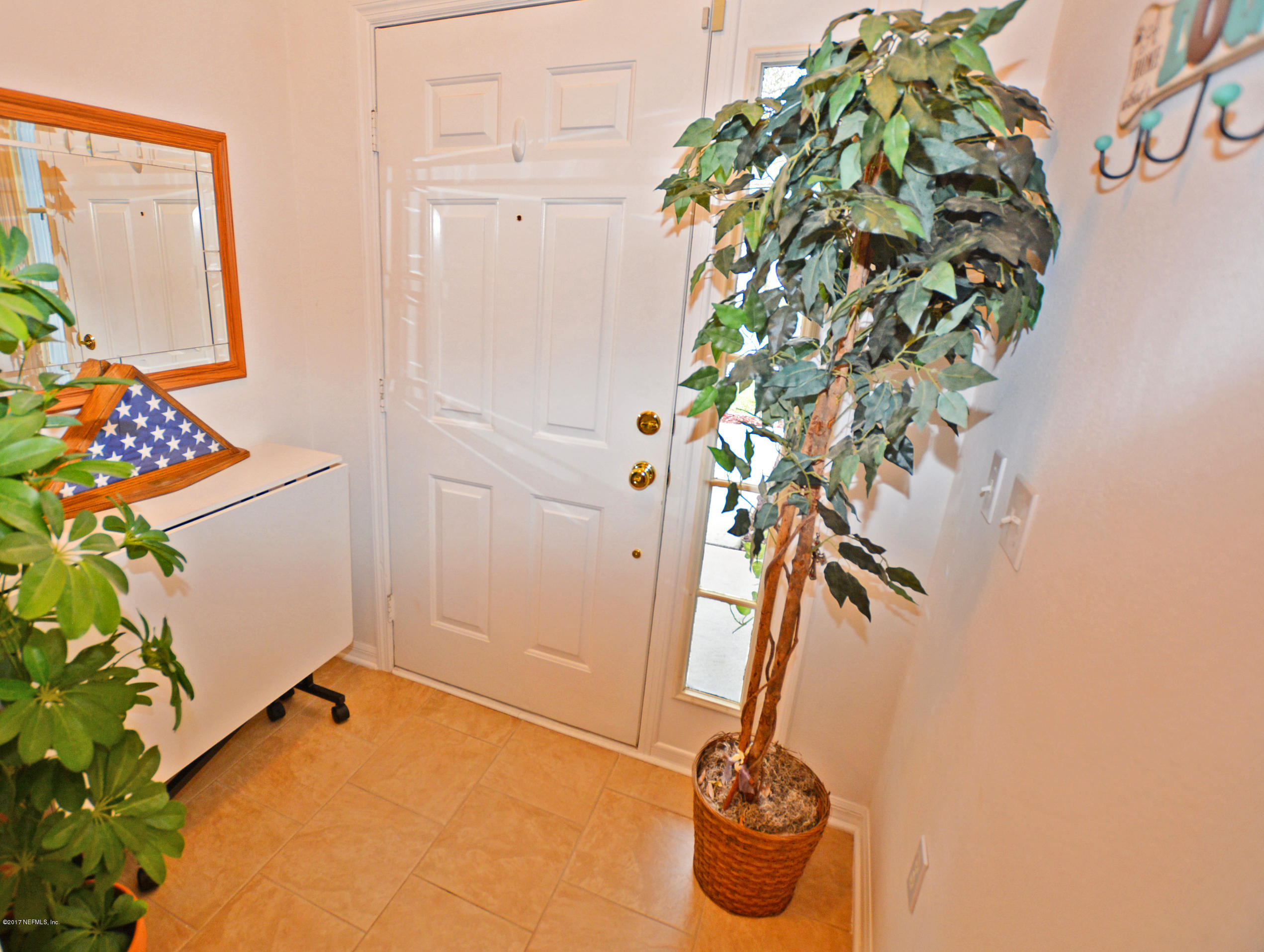 7319 Gum Tree Road Jacksonville, FL 32244 - Photo 4 of 41 utility room with a potted plant