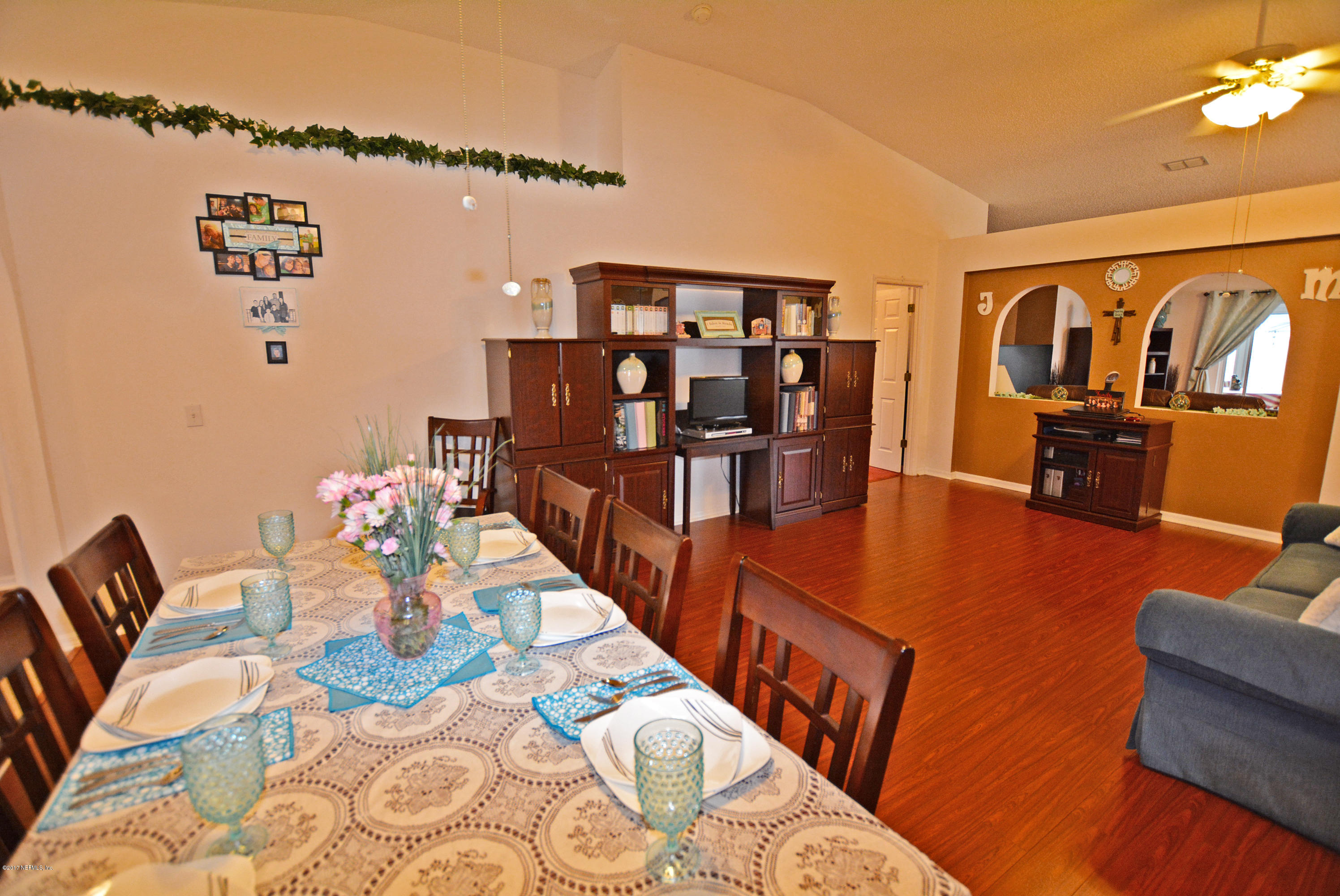 7319 Gum Tree Road Jacksonville, FL 32244 - Photo 8 of 41 a view of a dining room with furniture
