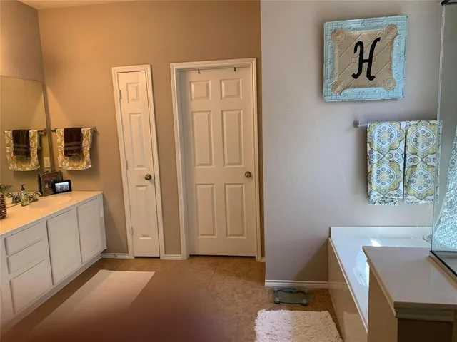 a view of a hallway with workspace