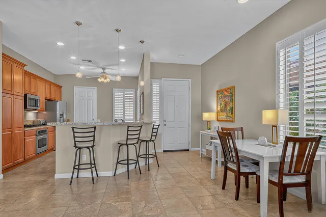 a view of a dining room with furniture