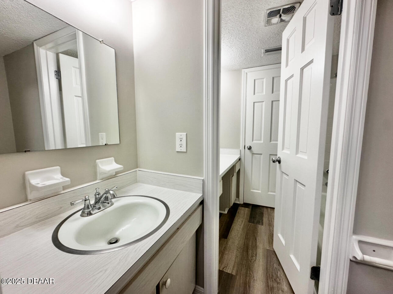 2250 South Palmetto Avenue, Unit J3 South Daytona, FL 32119 - Photo 13 of 20 a bathroom with a sink and a mirror