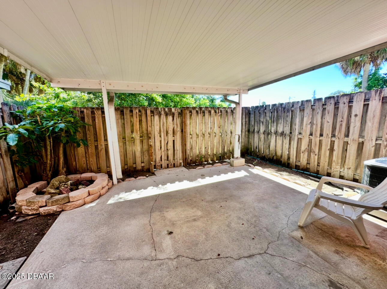 2250 South Palmetto Avenue, Unit J3 South Daytona, FL 32119 - Photo 19 of 20 a view of a backyard with wooden fence