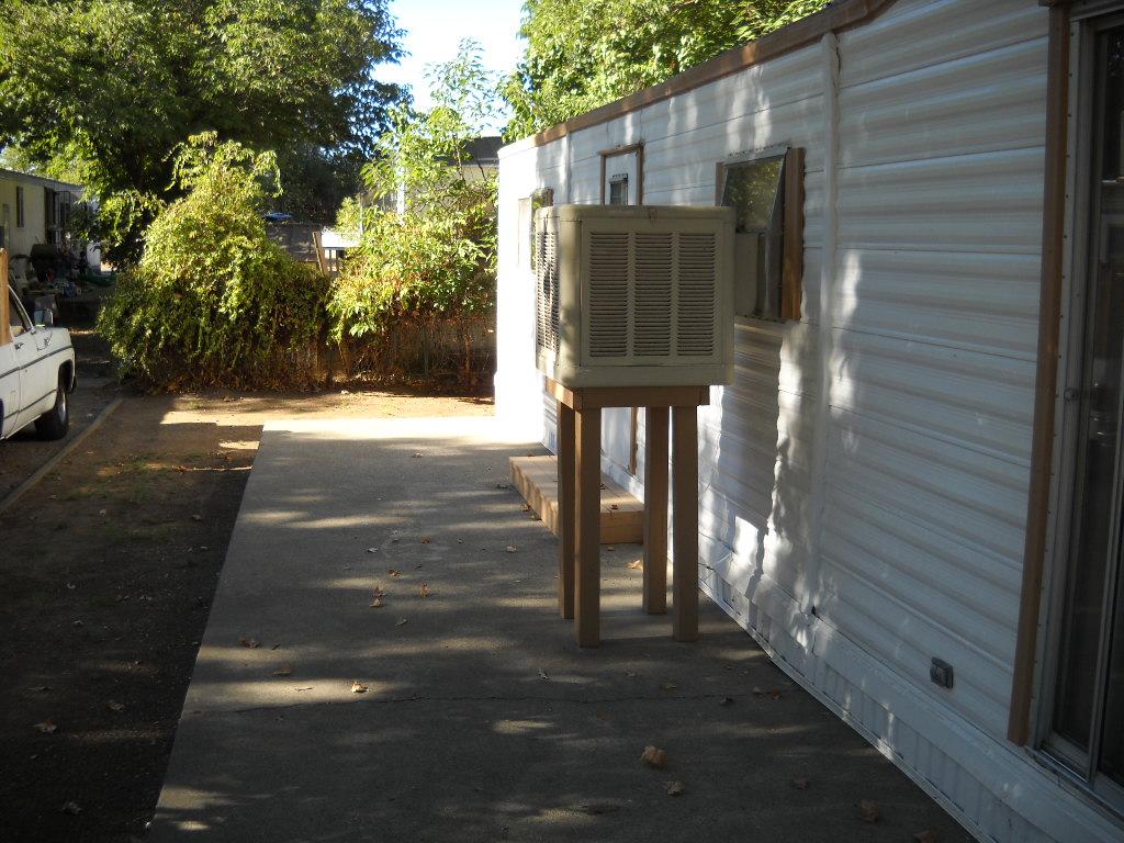 6870 Riverland Drive, Unit RIVERLAND Anderson, CA 96007 - Photo 8 of 8 a view of a house with a yard