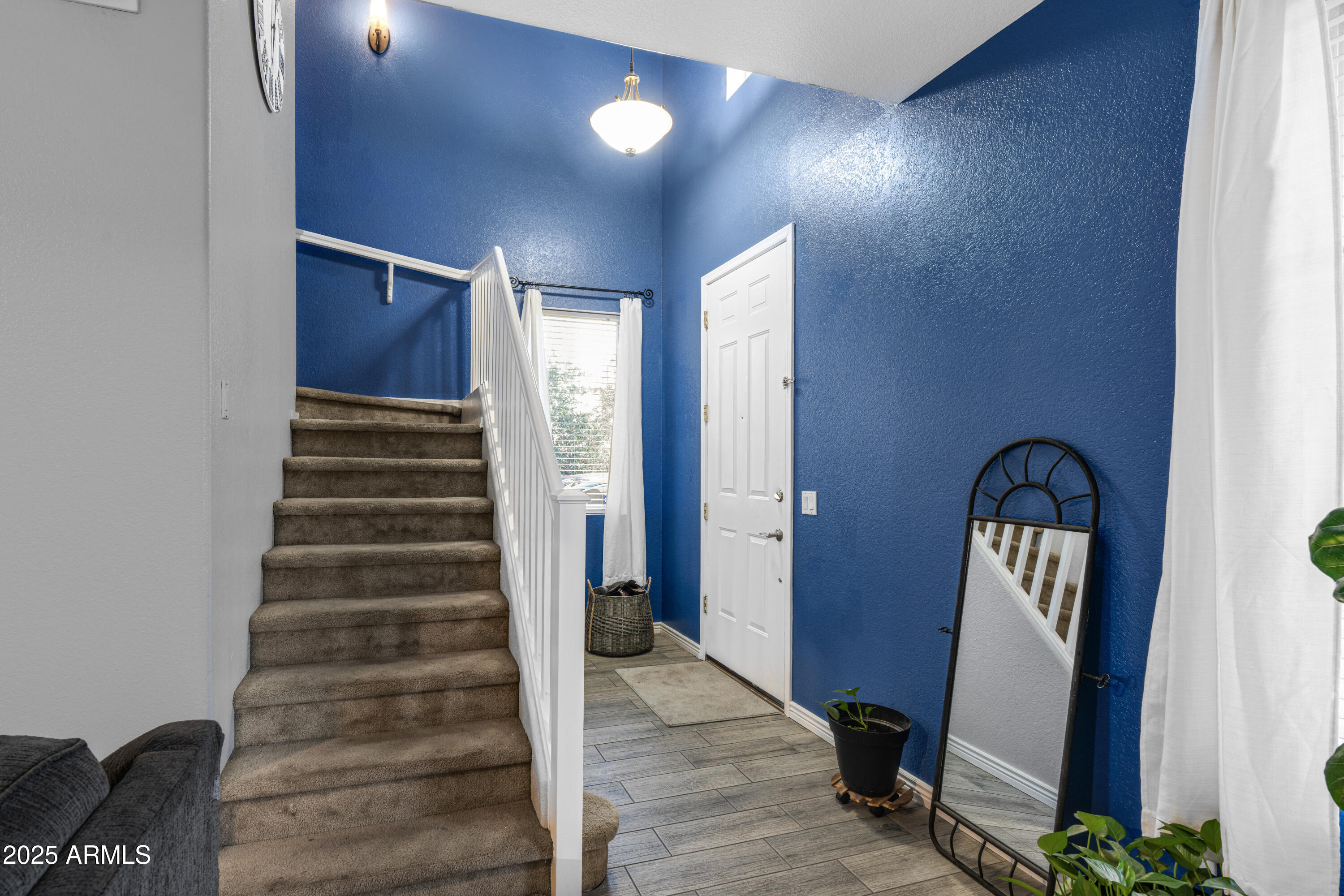 1512 East Chipman Road Phoenix, AZ 85040 - Photo 11 of 21 a view of front door with stairs