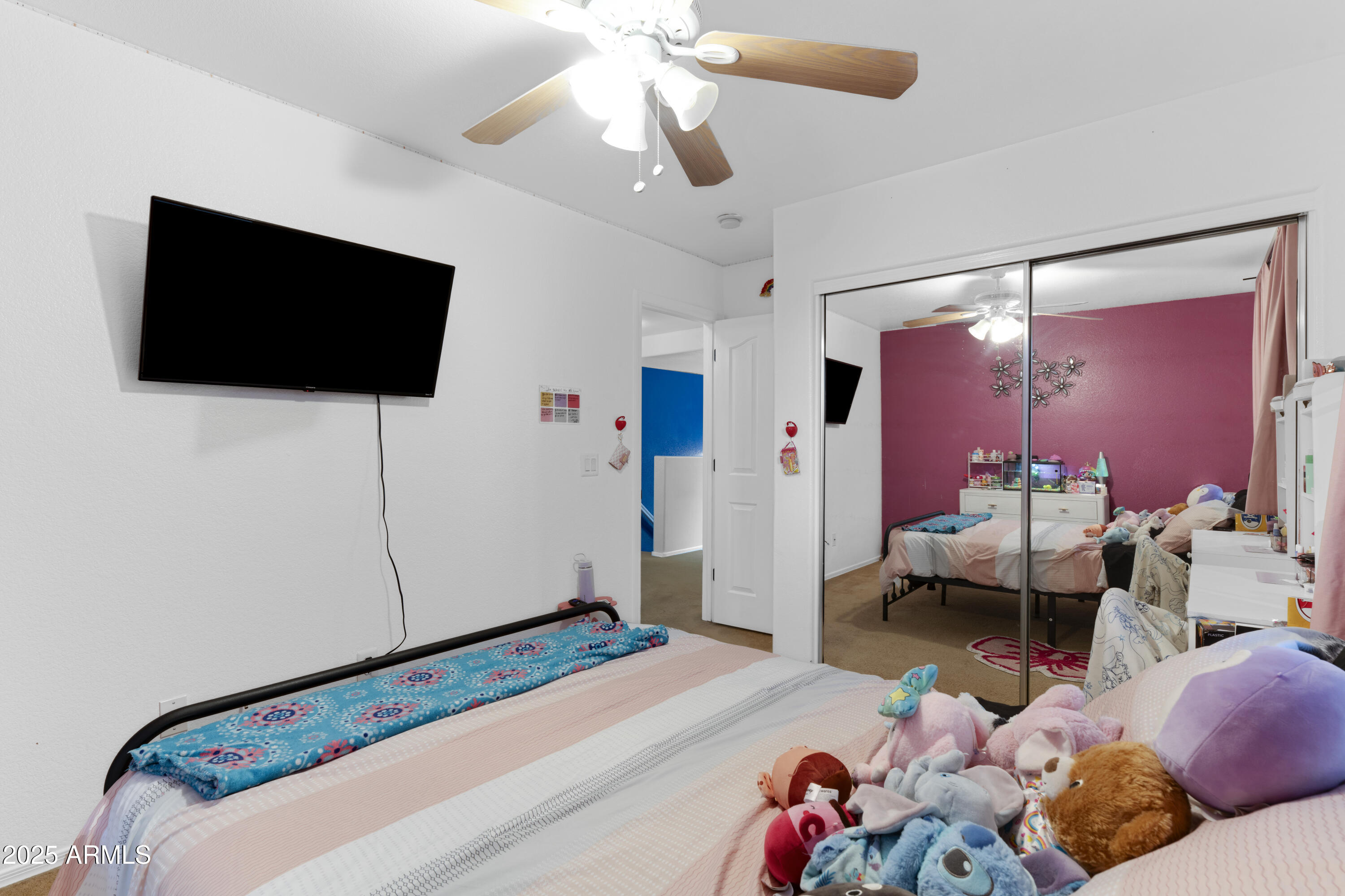 1512 East Chipman Road Phoenix, AZ 85040 - Photo 16 of 21 a living room with furniture and a flat screen tv