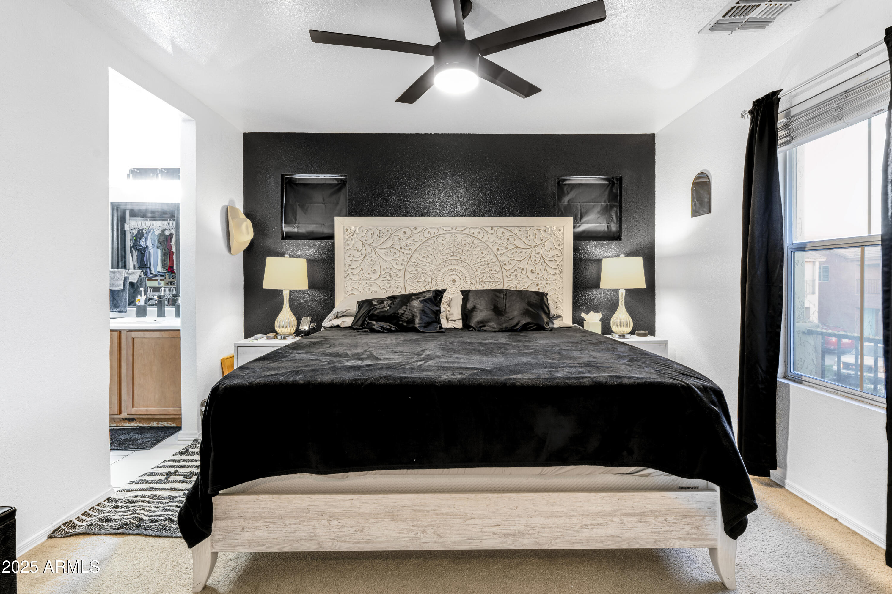 1512 East Chipman Road Phoenix, AZ 85040 - Photo 18 of 21 a bedroom with a bed and window