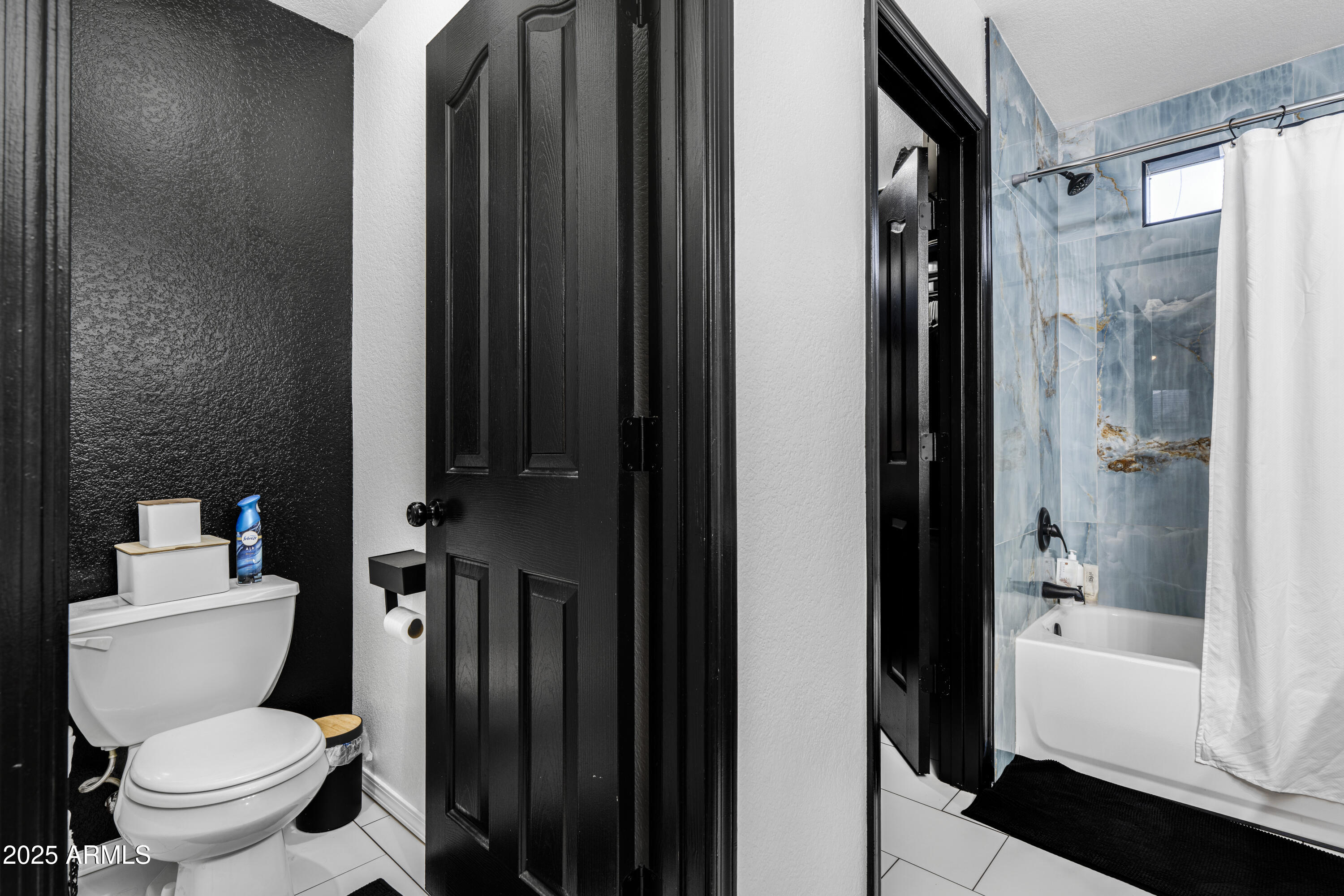 1512 East Chipman Road Phoenix, AZ 85040 - Photo 21 of 21 a bathroom with a toilet and a shower