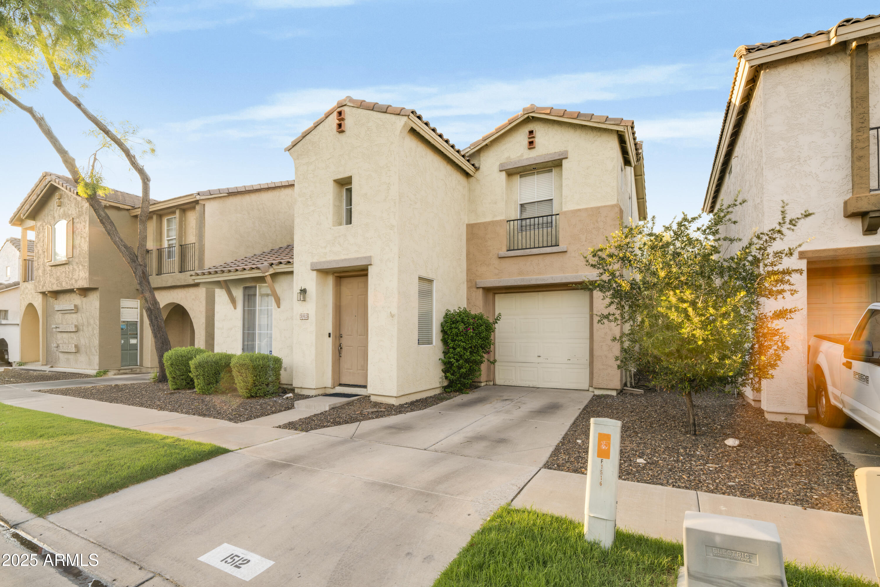 1512 East Chipman Road Phoenix, AZ 85040 - Photo 3 of 21 a front view of a house with a yard