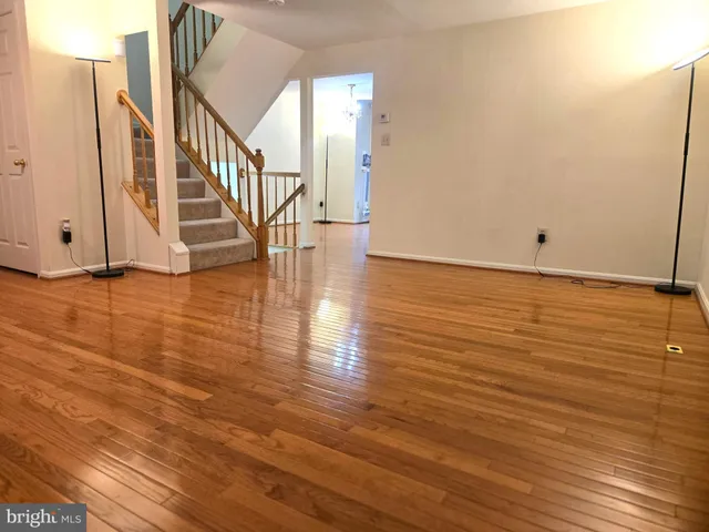 a view of an ocean with wooden floor