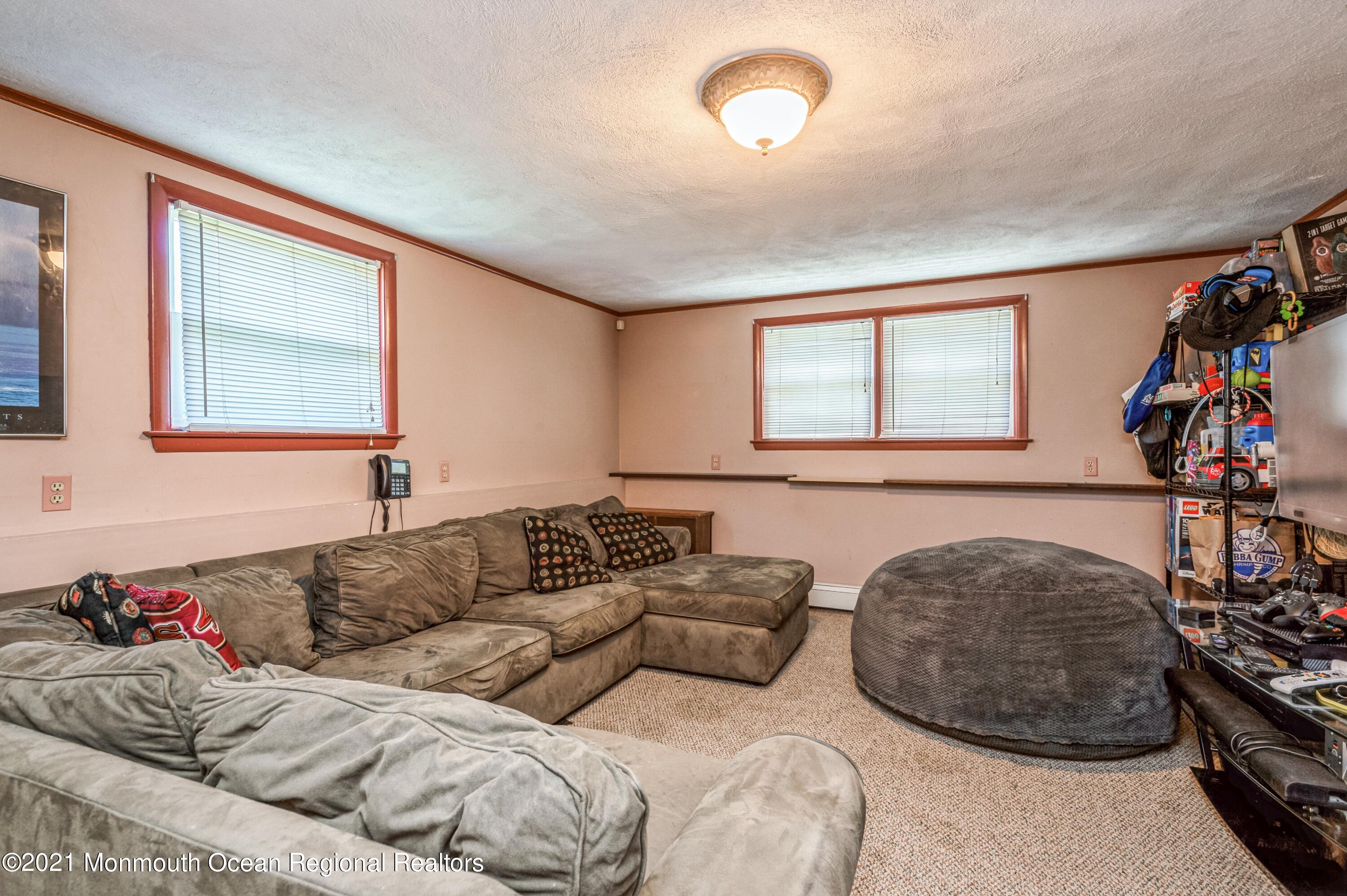 1133 Roe Avenue Point Pleasant, NJ 08742 - Photo 12 of 21 11_1133RoeAvenue_3_FamilyRoom_HiRes