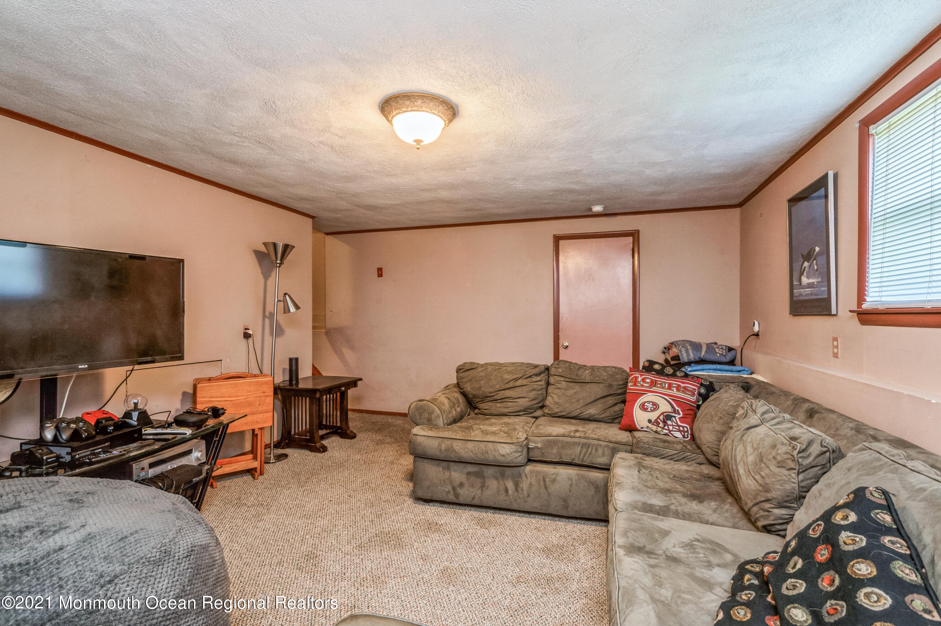 1133 Roe Avenue Point Pleasant, NJ 08742 - Photo 13 of 21 12_1133RoeAvenue_3002_FamilyRoom_HiRes