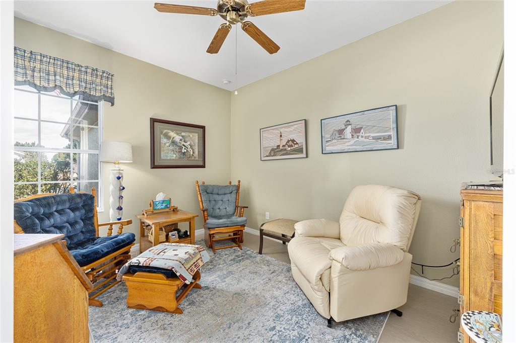 16339 Southwest 14th Avenue Road Ocala, FL 34473 - Photo 16 of 22 a living room with furniture and a window
