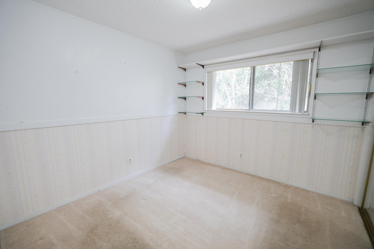 805 B Street Davis, CA 95616 - Photo 11 of 17 a view of an empty room with a window