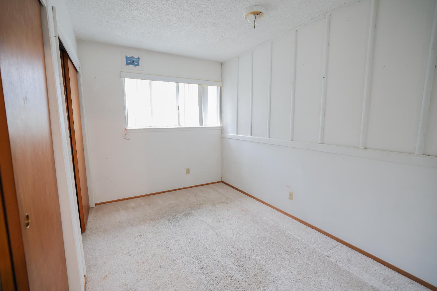 805 B Street Davis, CA 95616 - Photo 13 of 17 an empty room with windows