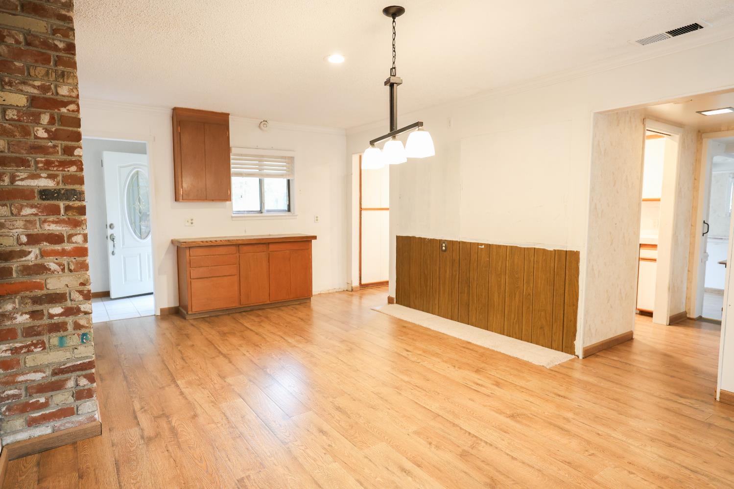 805 B Street Davis, CA 95616 - Photo 6 of 17 a view of a room with wooden floor and a ceiling fan