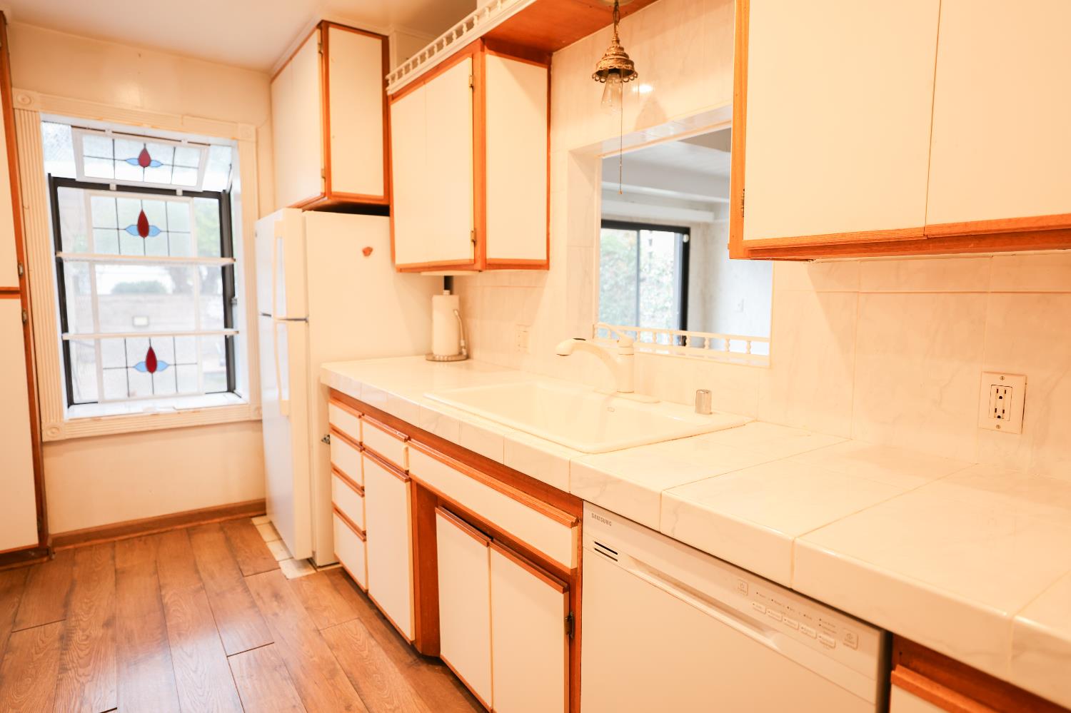 805 B Street Davis, CA 95616 - Photo 8 of 17 a bathroom with a sink and a mirror